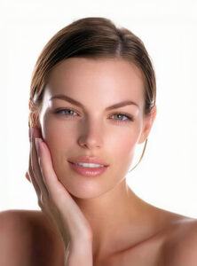 Beautiful brunette woman receiving a cosmetic treatment at Dr. Buckner's office in Los Gatos.